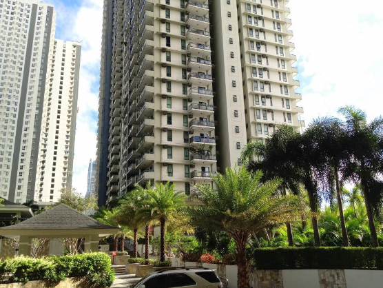 Flair Towers Condominium with Parking Slot